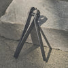 Tenoverten The Small Clip (1 pc) - product shown on cement step. 