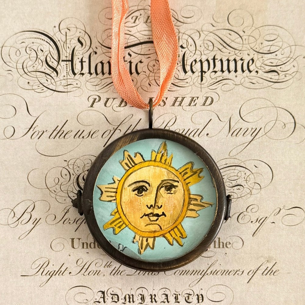 Maris Mirum Small Locket - Clarus Sun (1 pc) on vintage document