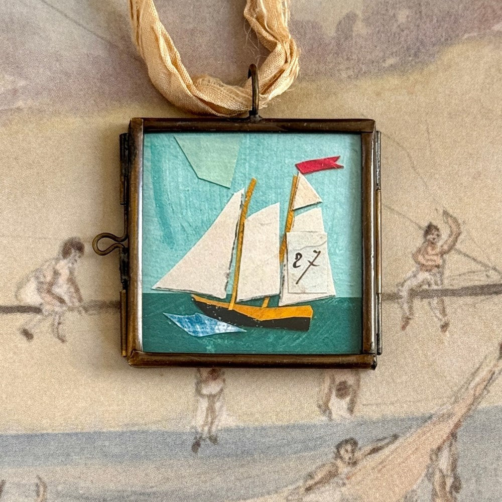 Small Locket - Small Sail 27 (1 pc) with decorative paper in background with illustrations of sailors