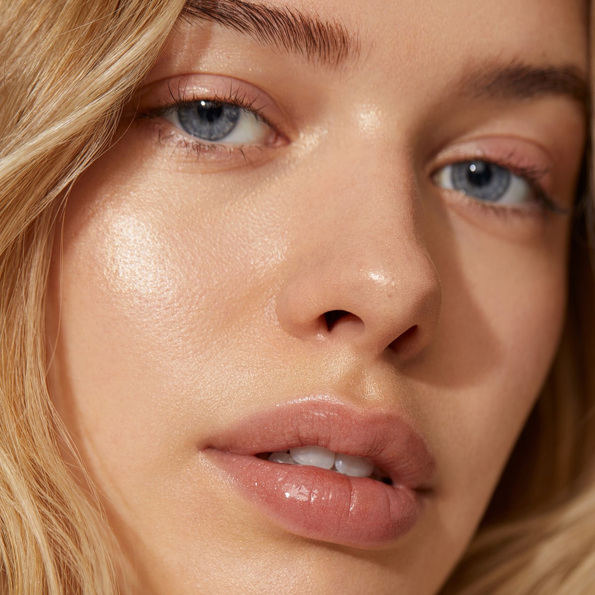 Close-up of model wearing Minori Lip Gloss - Cozy