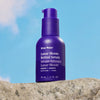 Ursa Major Lunar Bloom Retinal Serum (1 oz) - product shown on bright blue background and stone. 