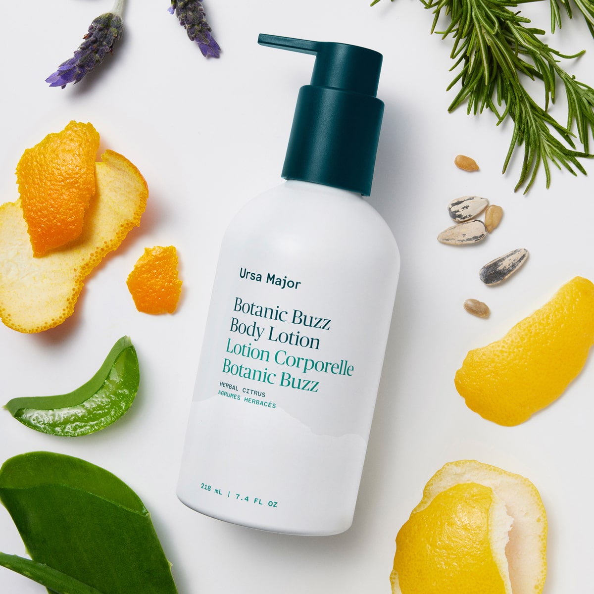 Ursa Major Botanic Buzz Body Lotion (7.4 oz) - product shown with aloe and fruit. 