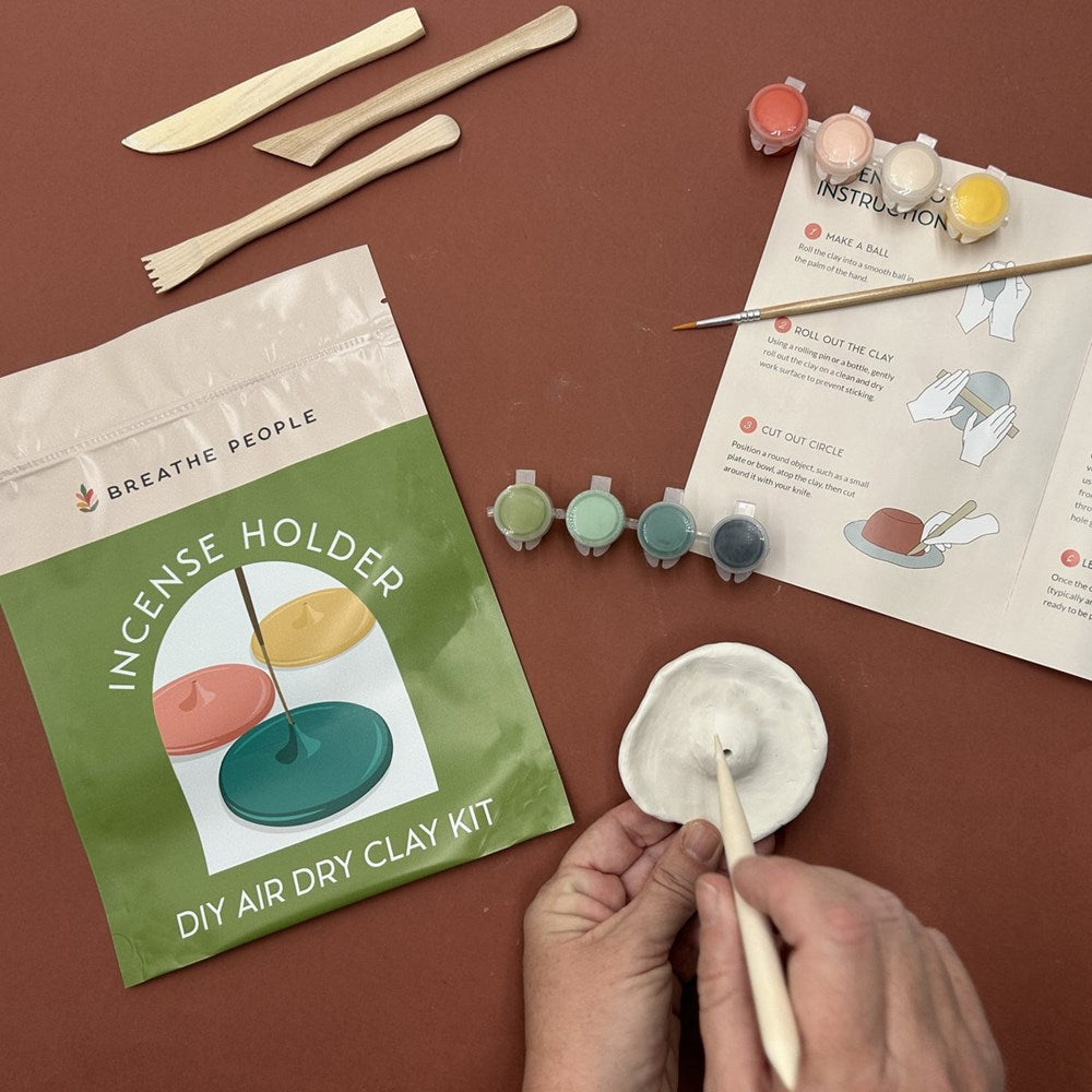 Breathe People DIY Air Dry Clay Kit – Make Your Own Incense Holder (1 kit) - person using product. 