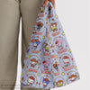 Standard Baggu – Hello Kitty & Friends Western (1 pc) - product shown being held by model. 