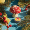 Kalastyle Soap Co. Swedish Dream Minty Mushroom Lip Balm (22 g) shown with decorative mushroom on a blue background surrounded by Christmas decorations.