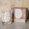 Jamie Beck La Roseraie Candle (6.34 oz) - product shown next to packaging. 