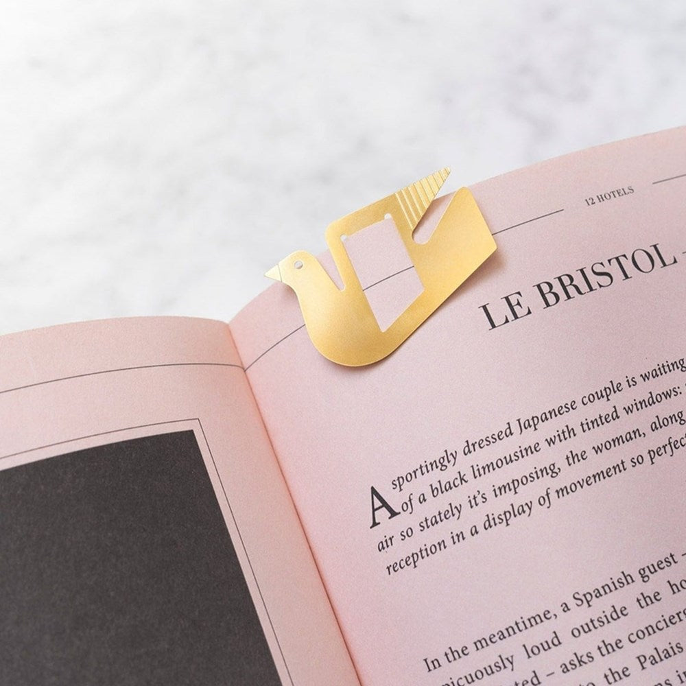 Octaevo Bird Greeting Card and Multi-use Metal Clip (1 pc) - product shown on book (book not included).
