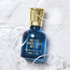 Paul & Joe Beaute Double Concentrate Serum (40 ml) - product shown with bubbles and liquid background. 