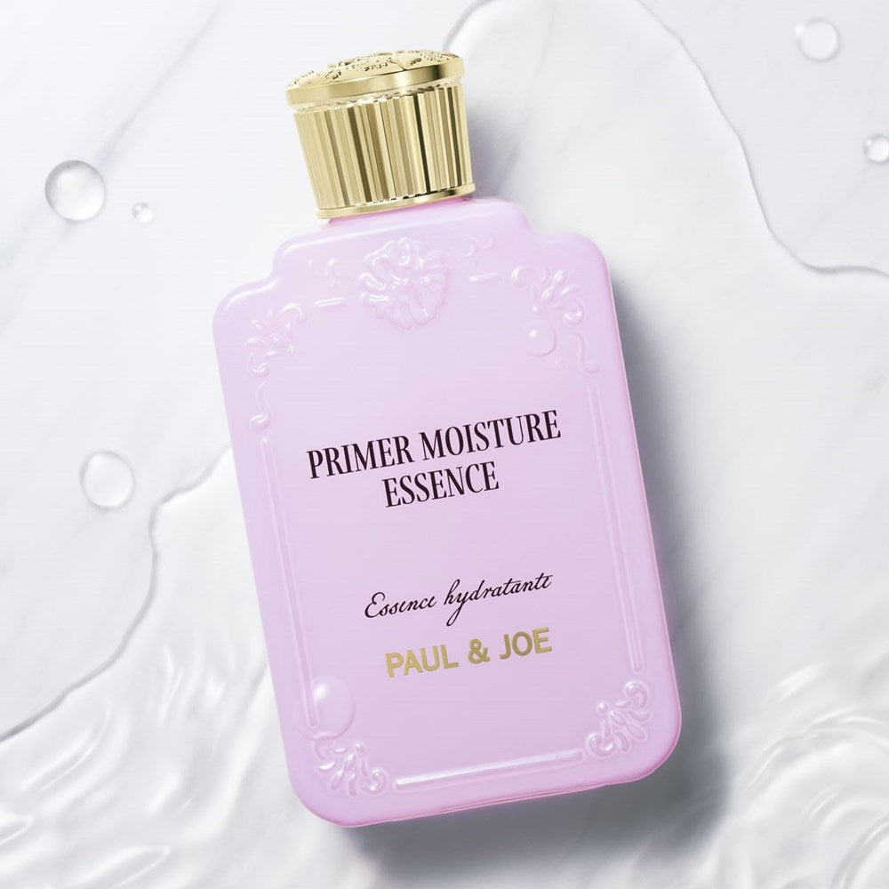 Paul & Joe Beaute Firming Body Oil (80 ml) - product shown on wet background.