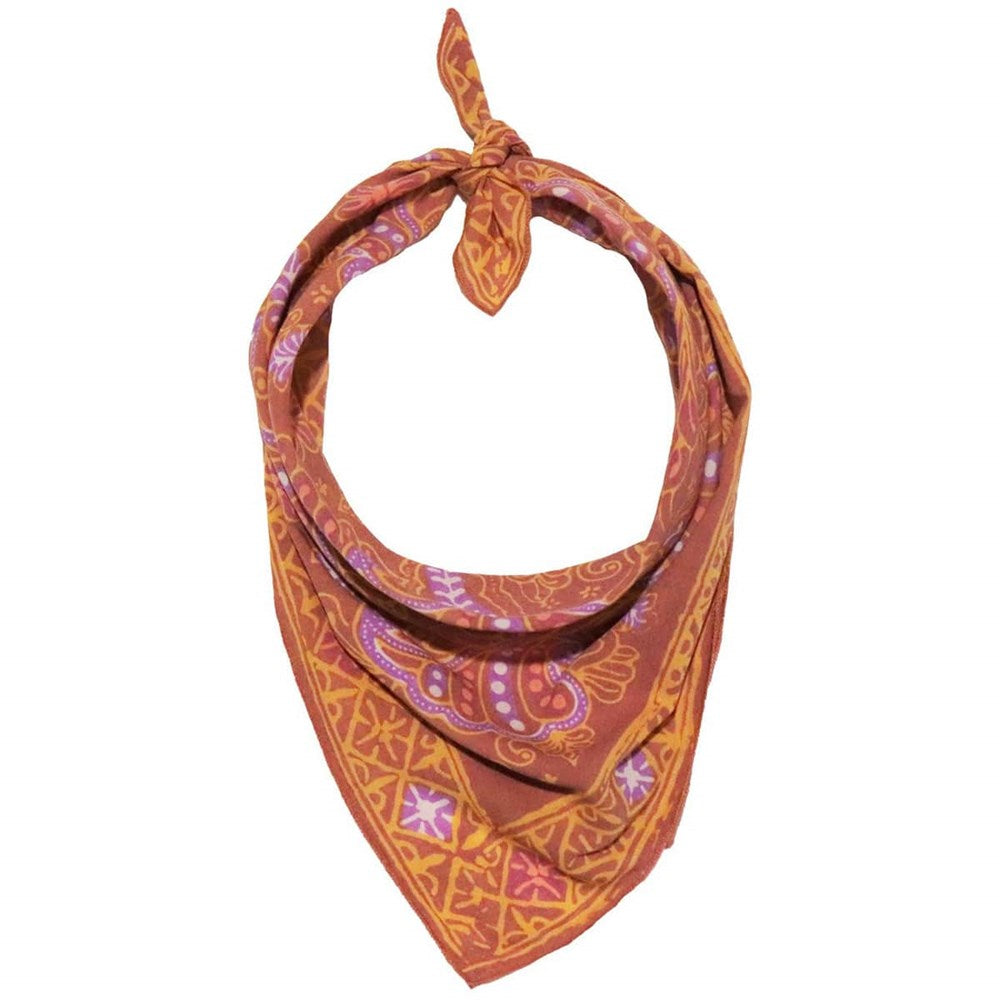 Kasih Co-op Hand Dyed Batik Bandana - Dusky Fern, Pink, Yellow, Purple (1 pc) - product shown styled.