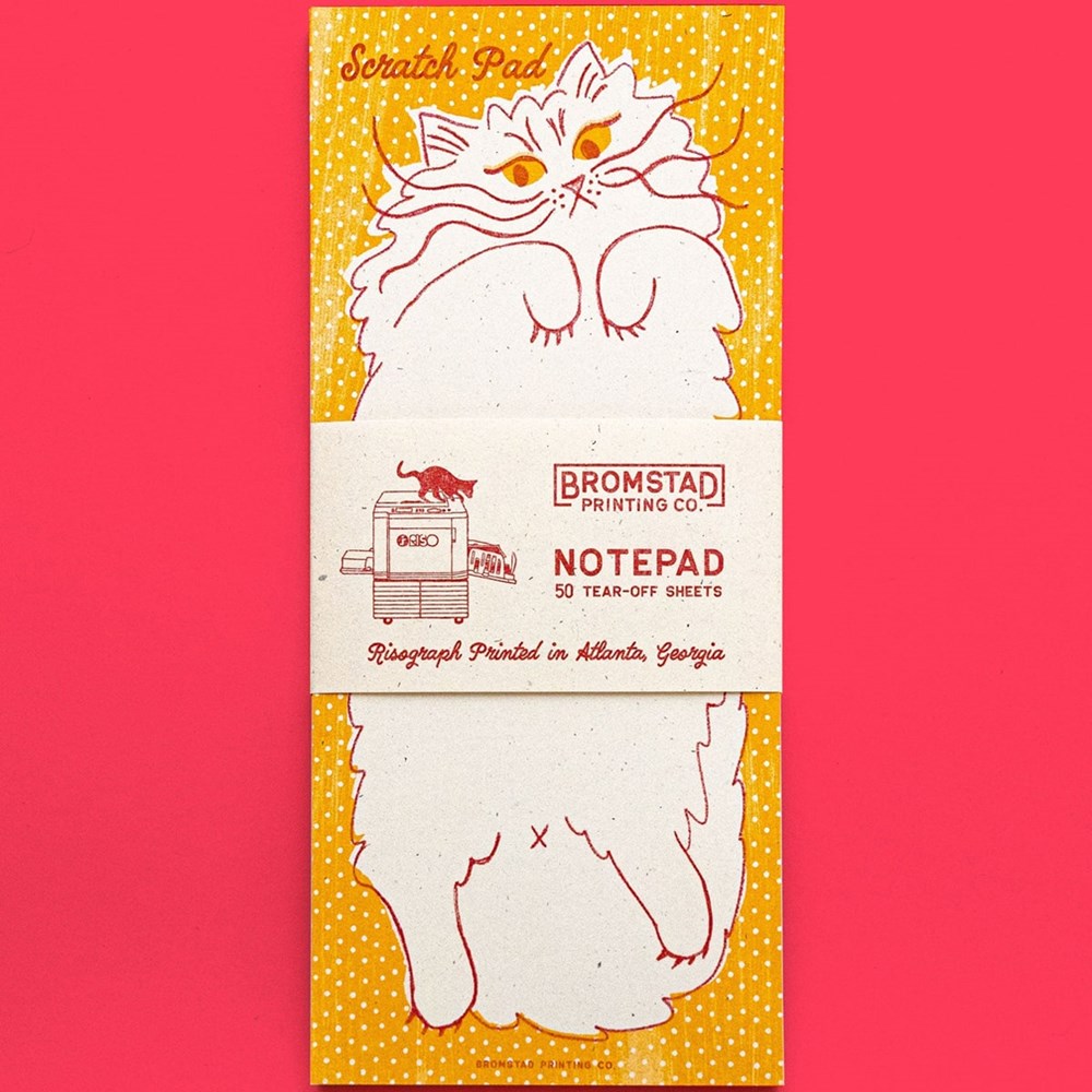 Bromstad Printing Co. Scratch Pad (1 pc) - product shown in packaging on red background. 