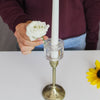 Floral Genius Candle Ring Vase Set (2 pcs) - model putting flower into product. 