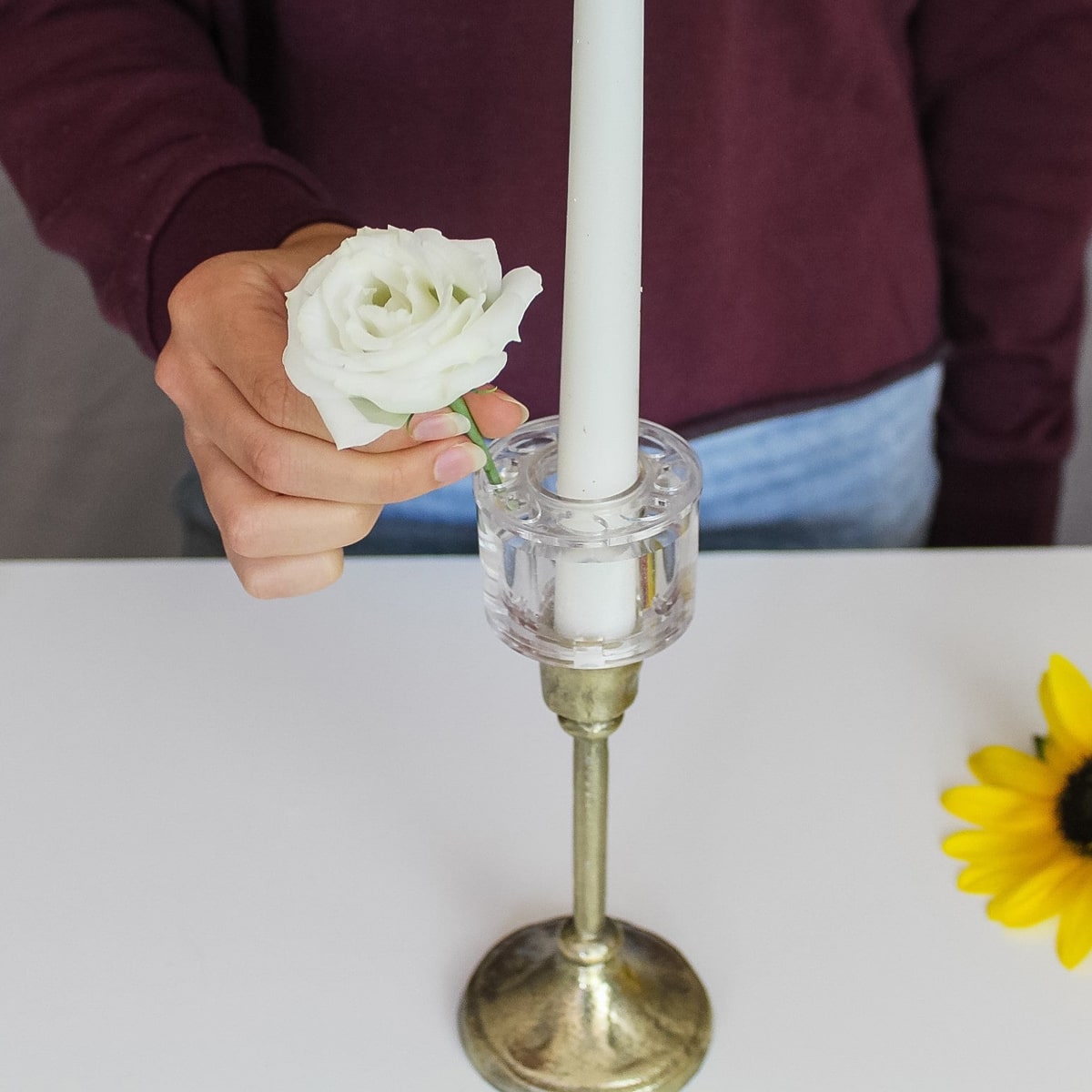 Floral Genius Candle Ring Vase Set (2 pcs) - model putting flower into product. 