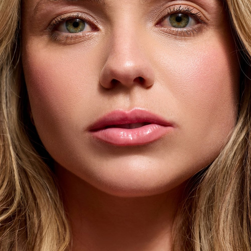 Cote The Necessity Peptide Lip Shine - Branson (3.5 ml) -product shown on model. 