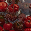 Flamingo Estate Organics Heirloom Tomato Hand Soap (355 ml) - Tomatoes shown in water.