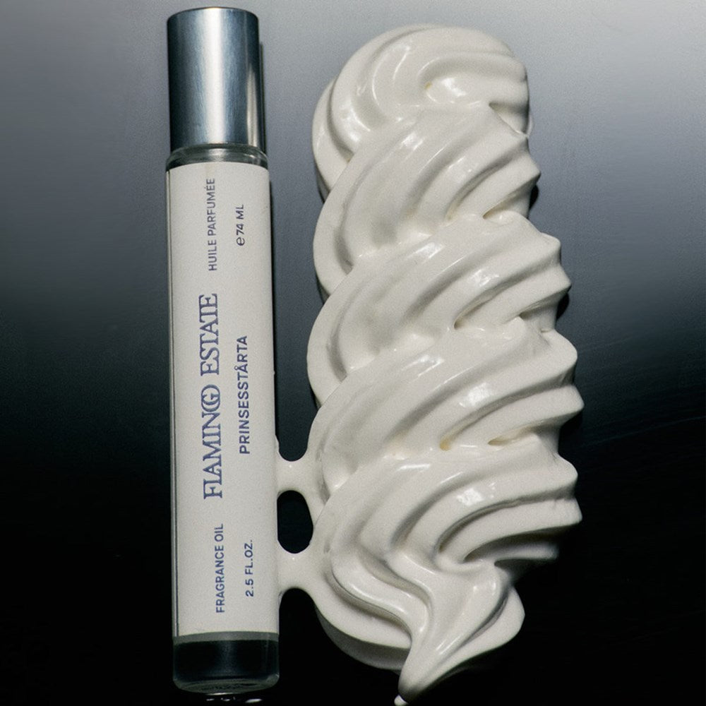 Flamingo Estate Organics Prinsesstarta Fragrance Oil (8 ml) - product shown next to cream. 