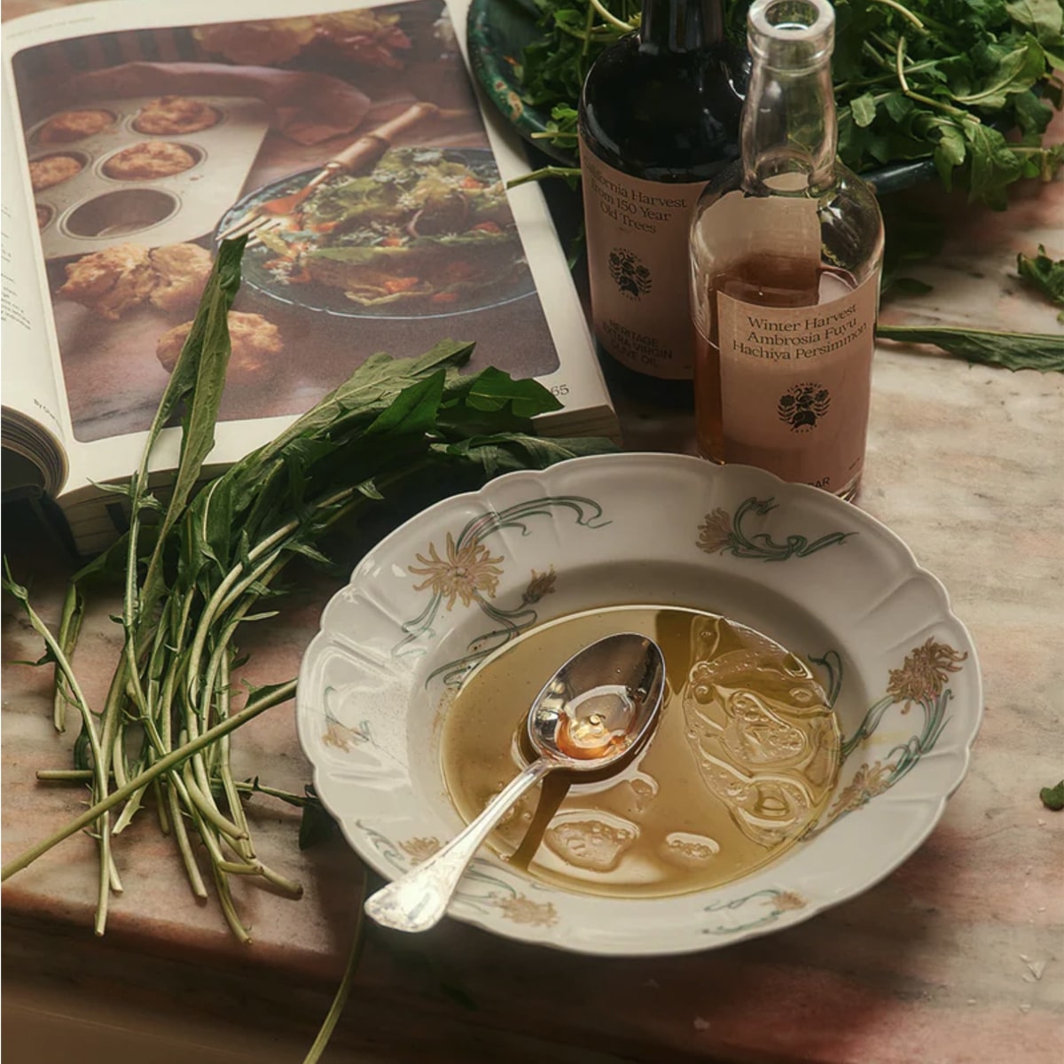 Flamingo Estate Organics Olive Oil and Fuyu Persimmon Vinegar Gift Box Set (2 pcs) - product shown next to bowl. 