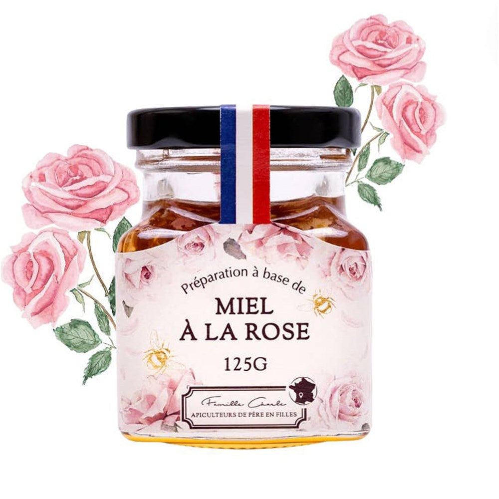 Les Abeilles de Malescot Rose Petal Infused Honey (125 g) - product shown with drawn roses in the background. 