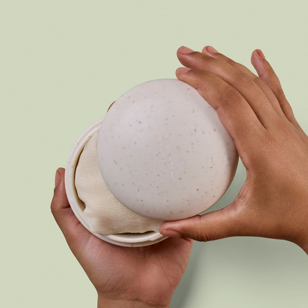 Kate McLeod The Travel Case - Oatmeal (1 pc) - product shown on green background. 