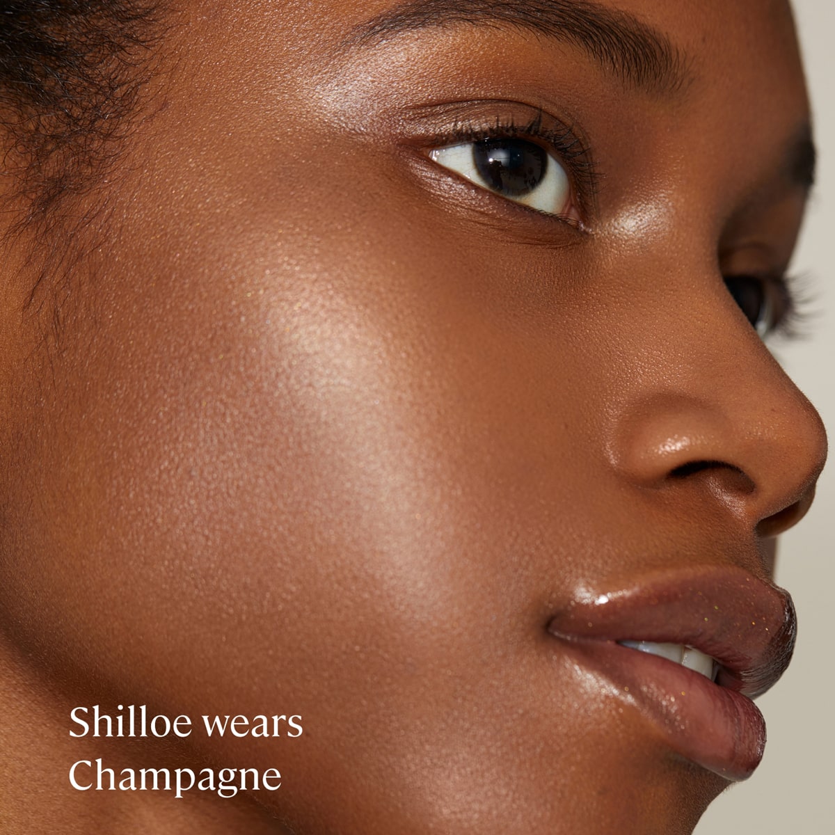 Model wearing Minori Champagne Cream Highlighter