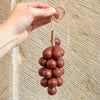 Botanopia Handcrafted Grapes Soap - Wine (100 g) - product shown being held by a person. 
