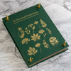 Botanopia The Botanical Flower Press - Linen Cover & Gold Foil (1 kit) - product shown on marble counter. 