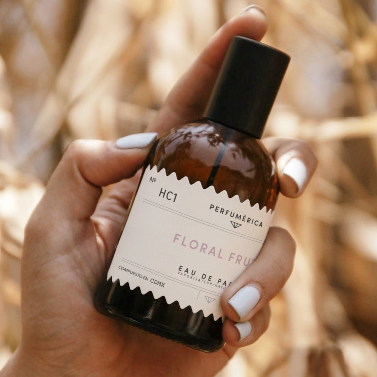 Perfumerica Floral Frutal Eau de Parfum (120 ml) - product shown in hand. 