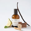 Perfumerica Madera Oud Eau de Parfum (120 ml) - product shown next to fruit and salt. 