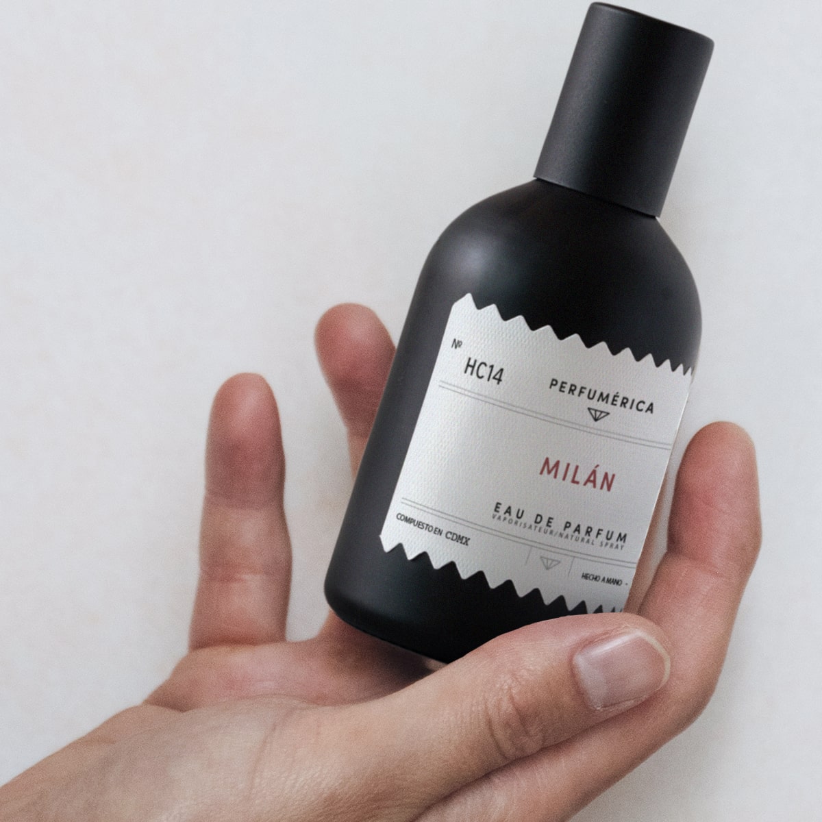 Perfumerica Milan Eau de Parfum (120 ml) - product shown being held. 