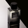Essential Perfumes Bois Imperial Collector Edition by Quentin Bisch (100 ml) on a reflective surface with a black and white background.