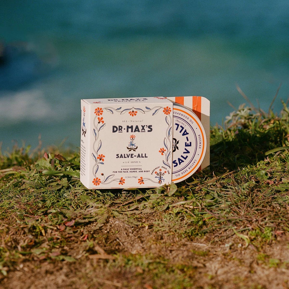 Dr. Max’s Salve-All (3.3 oz) - product shown cliffside. 