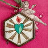 Maris Mirum Small Locket - Sacred Heart (1 pc) with cherub/angel on a pink background