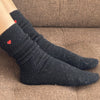 Le Bon Shoppe Embroidered Snow Socks - Black (1 pair) - product shown modeled on brown fabric. 