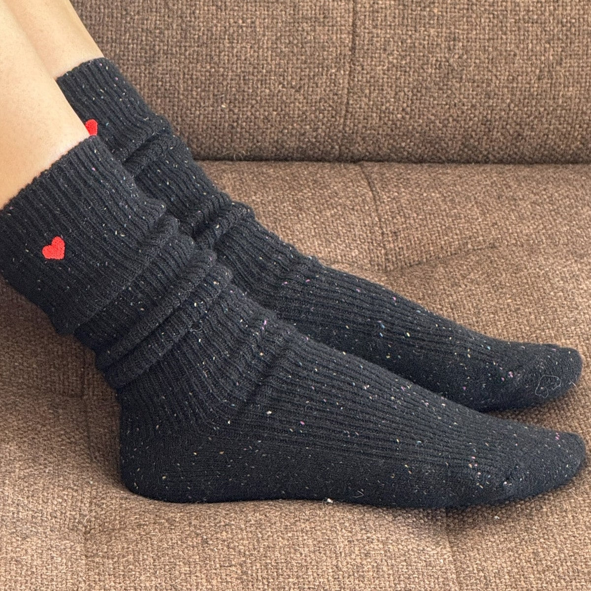 Le Bon Shoppe Embroidered Snow Socks - Black (1 pair) - product shown modeled on brown fabric. 