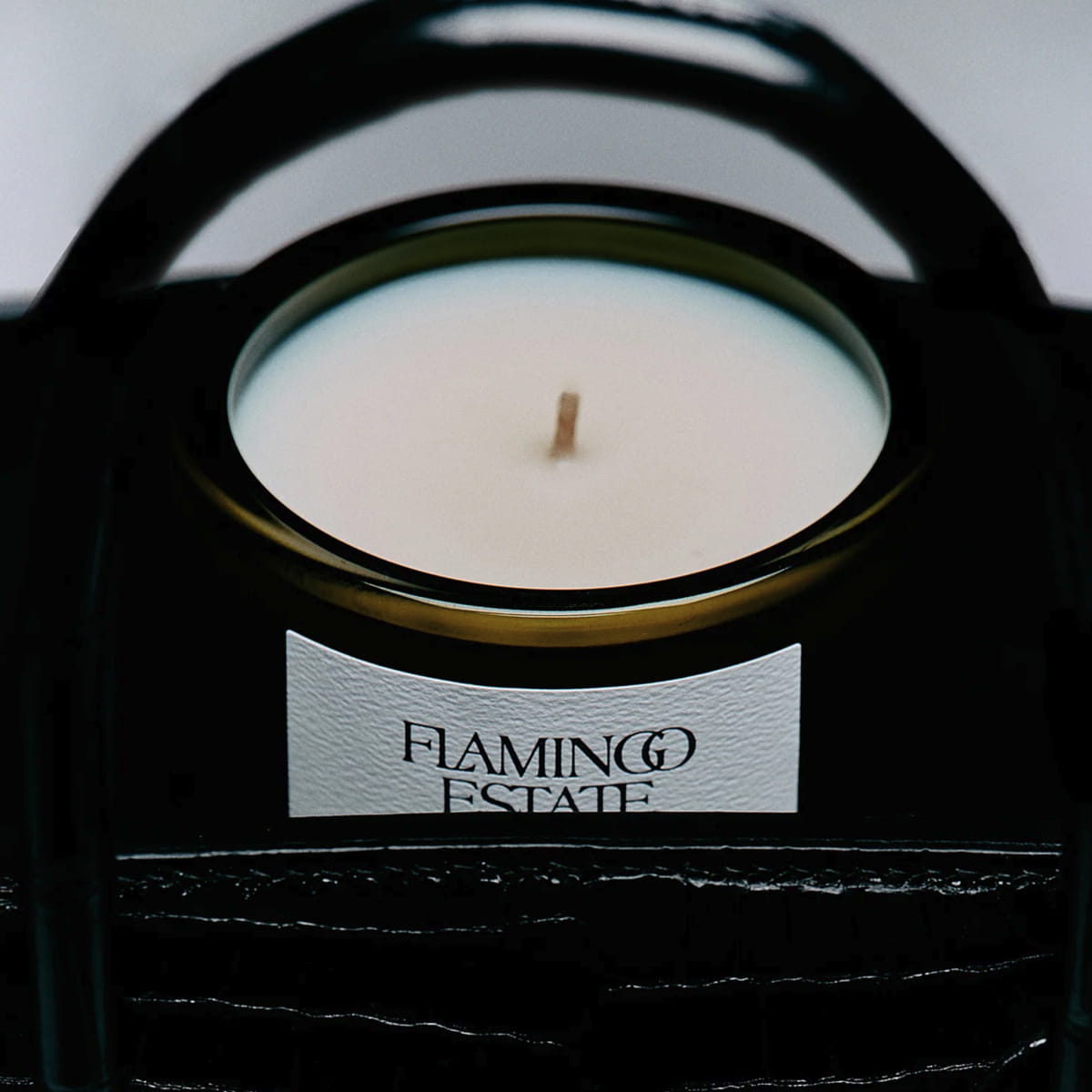 Flamingo Estate Leather Appointment (226 g) - product shown inside of a leather bag.