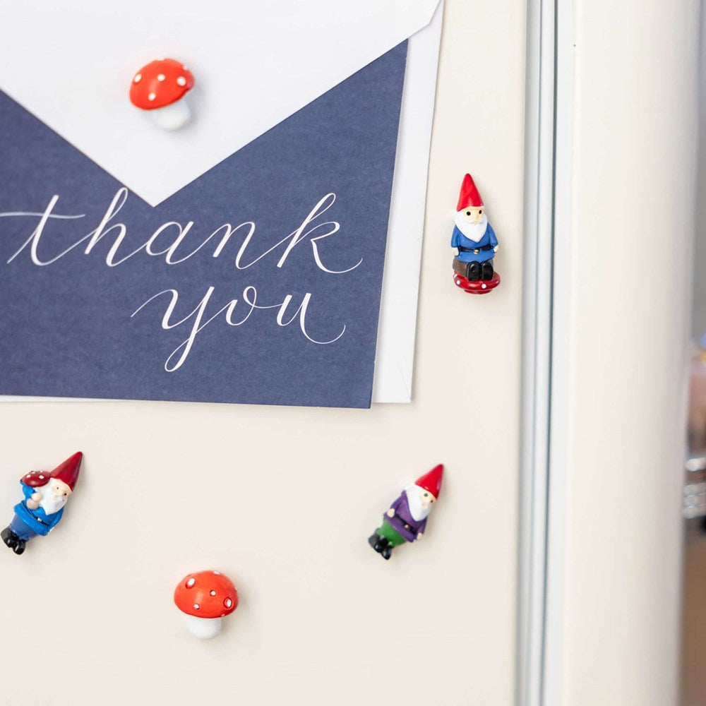 Three by Three Seattle Colorful Gnome and Mushroom Magnets (5 pcs) - product shown on fridge holding a card up ( card not included).