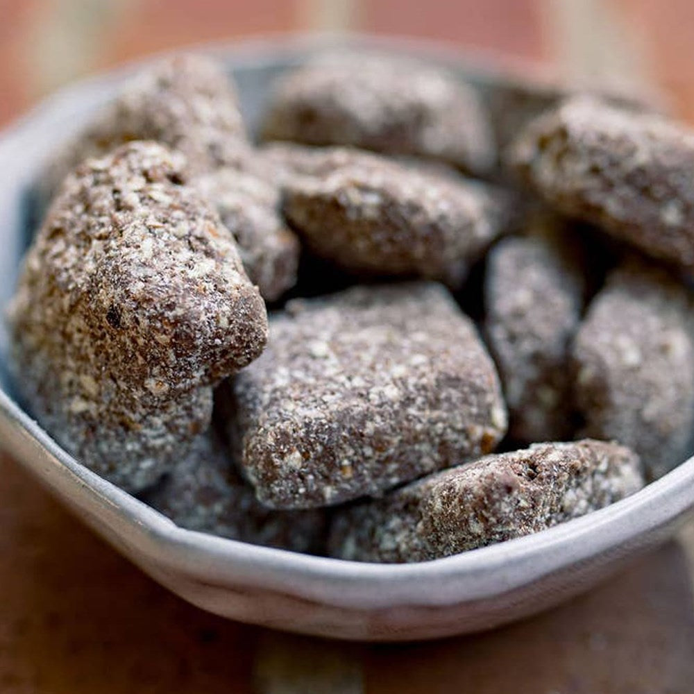 Zorro Pecans Milk Chocolate Pecan Toffee (3.25 oz) - product shown in grey bowl. 