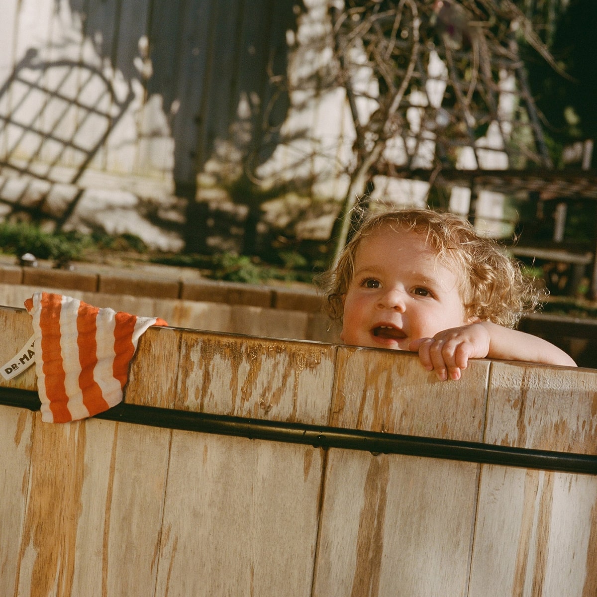 Dr. Max’s Organic Cotton Wash Cloths Set (5 pcs) - product shown next to child. 