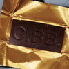 Casa Bosques Date Carmel Chocolate Bar (60 g) - product shown in gold foil. 