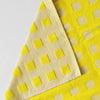 Close up of Wrap Squares Oat/Yellow Cotton Tea Towel (1 pc) showing front and part of back side