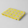 Wrap Squares Oat/Yellow Cotton Tea Towel (1 pc) shown folded