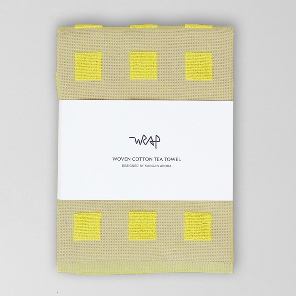 Wrap Squares Oat/Yellow Cotton Tea Towel (1 pc) shown folded