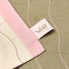 Wrap Wave Grid Cotton Tea Towel (1 pc) shown close up - front and back side