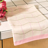 Lifestyle shot of Wrap Wave Grid Cotton Tea Towel (1 pc) on kitchen counter