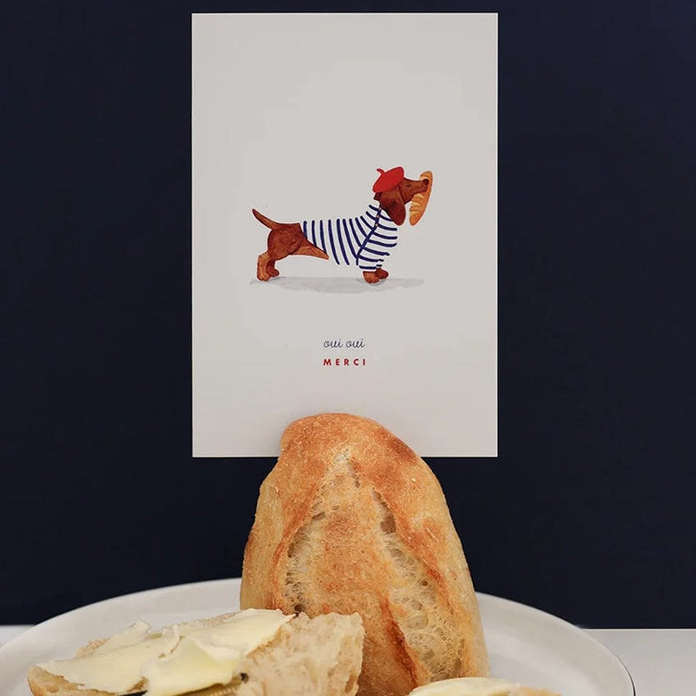 All The Ways To Say Oui Oui Merci Card (1 pc) - product shown in bread