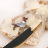 All The Ways To Say Little Frenchie Pin (1 pc) - product shown on bread with butter. 