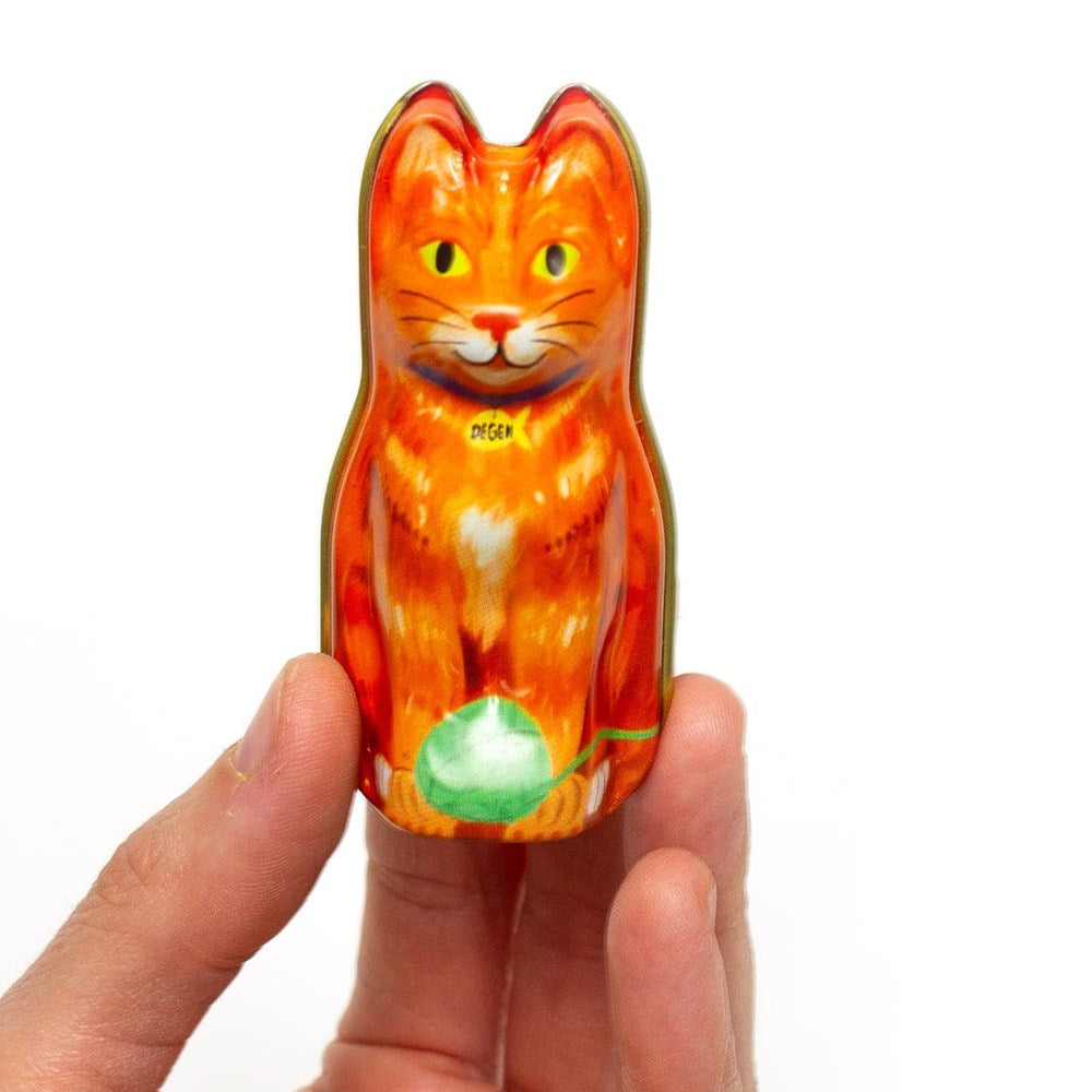 DEGEN Orange Cat Tin - Stitch Markers (2 pcs) - product shown being held. 
