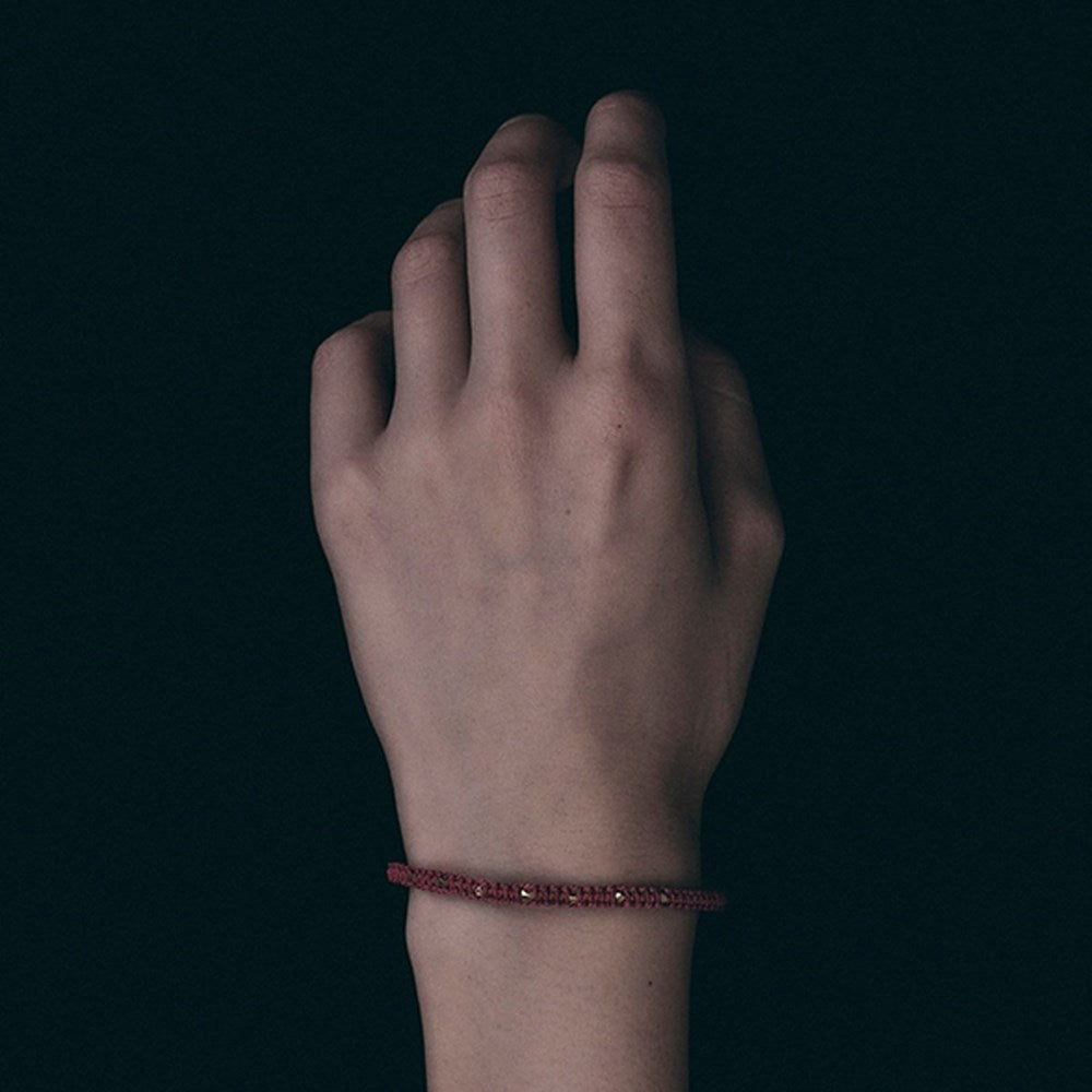 Fog Linen Work Saliima Adjustable Bracelet - Red (1 pc) - product shown on models hand. 