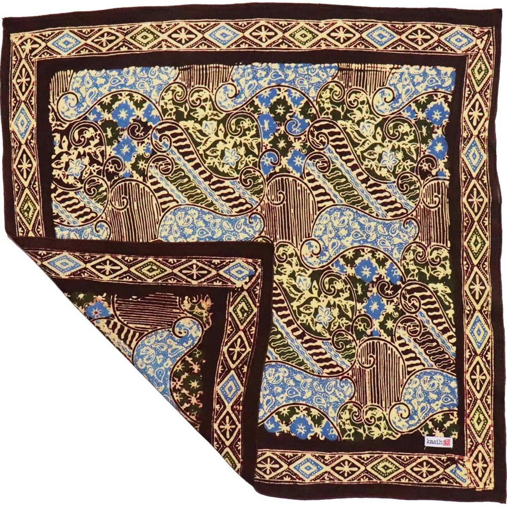 Kasih Co-op Hand Dyed Batik Bandana - Earth and Sky (1 pc) shown with one corner folded