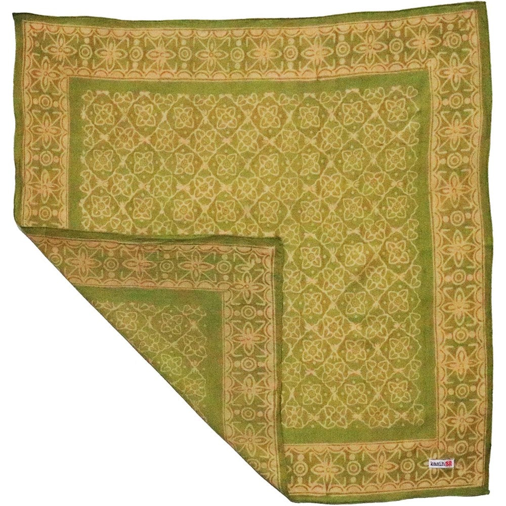 Kasih Co-op Hand Dyed Batik Bandana - Lime Blossom (1 pc) shown with one corner folded